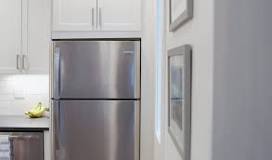 Where should you not put a refrigerator?