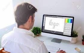 Graphic Designer Designing A On Computer. All Screen Graphics Are Made Up.  Stock Photo, Picture And Royalty Free Image. Image 71981192.