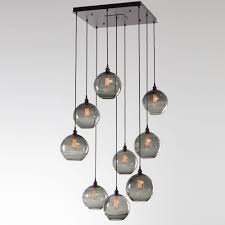 This Terra Globe Shade On This Multi Port Chandelier Achieves Its Stunning Effect From A Molten Glass Multi Light Pendant Pendant Lighting Hammerton Studio
