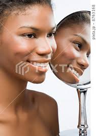 鏡 虚栄心 女 女性の写真素材