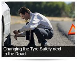 Day and night world map. Changing The Tyre Safely Next To The Road Arrive Alive