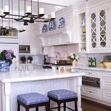 If you prefer to keep the look of the dress up your kitchen or dining room table with some black place mats. 25 Classic White Kitchens With Blue White Accessories The Glam Pad