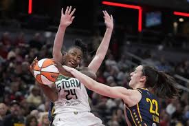 Caitlin Clark breaks WNBA rookie assists record as Fever beat Storm 92-75 |  AP News