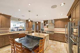 Upper cabinets pull down to the counter level. Project Overview Home Is Where The Heart Is