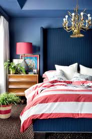 Surveys all over the world are in agreement—blue is the most popular color. 8 Top Interior Designers Who Were Self Taught Dark Blue Bedrooms Bedroom Design Home Bedroom