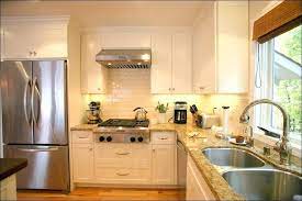 Cream Kitchen Cabinets With Stainless Steel Appliances Fresh Cream Colored Kitchen Cabin Tiny House Kitchen Antique White Kitchen Farmhouse Kitchen Inspiration