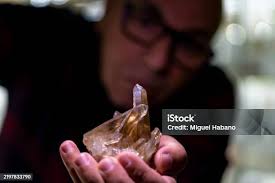 Hand Holding Crystal Stock Photo