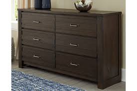 The most common black tall dresser material is wood. Darbry Dresser Ashley Furniture Homestore