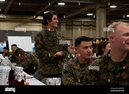 U.S. Marine Corps 1st Lt. Kanda Ryan, a disbursing officer with Service  Company, Combat Logistics Regiment 37, 3rd Marine Logistics Group,  addresses the mess during the mess night