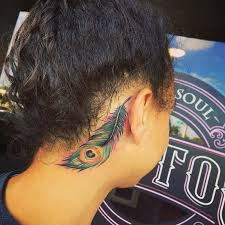 Other cute feather tattoo ideas for the ear include helix tattoos, ear. 100 Amazing Peacock Tattoos With Meanings And Ideas Body Art Guru