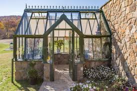 Greenhouse Against Stone Wall The Wall Will Radiate The Heat Gathered During The Day Over Night To Keep The Gr Victorian Greenhouses Greenhouse Cottage Garden