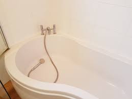 At that time less than 10 years old.the tile council of american does show a tub suround using mastic on dw. Mastic Sealant And Ceramic Bathroom Tile Renovation In Harrogate Bathroom Ceramic Tile Maintenance Tips