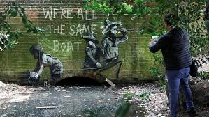 Banksy, anonymous british graffiti artist known for his antiauthoritarian art, often done in public places. Rdvf2jt6eg1j M