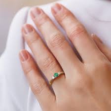 A classic vintage design that goes with everything. Emerald And Diamond Ring In Yellow Gold Klenota