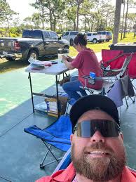 Buy plastic and jerky at disc golf event