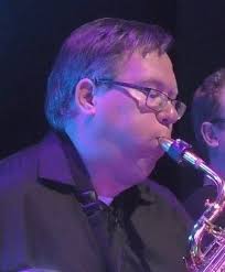 Can someone explain why Reds pitcher is allowed to wiggle front and back  and never stop before delivering the pitch? In my book every single pitch  should be a balk. But I'm