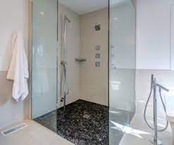 Shower Floor Ideas That Reveal The Best Materials For The Job Stone Shower Floor Shower Floor Pebble Tile Shower Floor