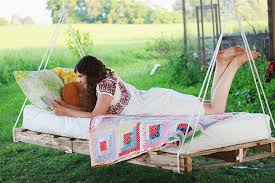 The idea of adding some hanging planters to the outdoor areas surrounding your home may you can still add greenery to your outdoor areas if you build a frame to hang the planters from. Diy Pallet Swing Bed The Merrythought