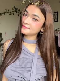 Stunning Hair Transformation with Red Highlights