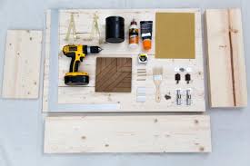 It features a corkboard and a bill organizer. How To Build A Wall Mounted Fold Down Desk Room Makeovers To Suit Your Life Hgtv