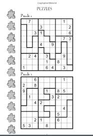A book full of jigsaw samurai sudoku puzzles. Jigsaw Sudoku Book