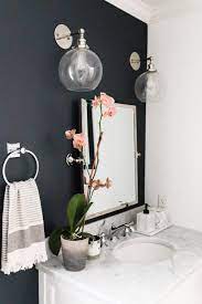 Beautiful powder room vanity with floating walnut cabinets. My Powder Room Redesign