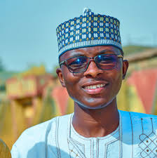 Mubarak Hussaini Barade added a...