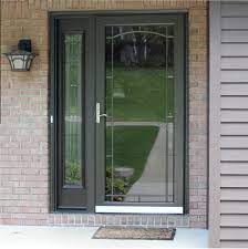 White aluminum self storing storm door with the following features: Replacement Front Doors Entry Doors Storm Doors Patio Doors