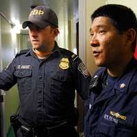 Coast Guard Petty Officer 1st Class Cory Sumner and