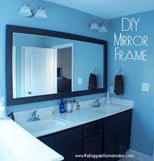 Change the builder grade mirror that was there when you moved in! Diy Bathroom Mirror Frame With Molding The Happier Homemaker