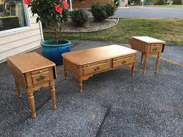 For a traditional look, pick out an oak coffee table with drawers. Oak Coffee And End Table Set