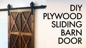 Sliding barn doors are all the rage these days, and they make a great home decor accent. Diy Plywood Sliding Barn Door For 200 How To Build Woodworking Youtube