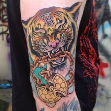 Wu tang clan tattoo by kyle cotterman post 4270 The C R E A M Of Wu Tang Clan Tattoos Tattoodo