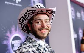The heavily inked singer's latest piece of art is on his left cheek and was revealed by a tattoo artist named ruben reza. Watch Post Malone Get A New Tattoo During A Dentist Appointment