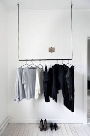 Hammer them down and the coat hanger is almost done. How To Store Clothes Without Wardrobes 25 Ideas Digsdigs