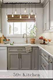 The following ideas show how white cabinets can make your kitchen more visually interesting. 50 Light Gray Kitchen Cabinets Cool Moody Grey Cabinets