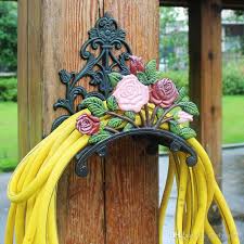 Esschert design garden tube holder country style cast iron green frog motif. 2021 Hose Holder Cast Iron Rose Flower Decorative Hose Reel Hanger Antique Garden Hose Holder Wall Mounted Lawn Garden Equipment Home Decoration From Haolyhelen 70 66 Dhgate Com