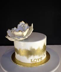 Graduation commencement can be the highlight of any student and their parents. White And Gold Cake Cakecentral Com