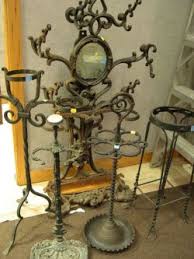 We did not find results for: Victorian Cast Iron Hall Tree Umbrella Stand And Wrought Iron Plant And Cane Stands And An Ice Cream Parlor Stool 2235 415 Skinner Auctioneers