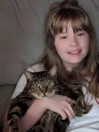 Anyone missing a cat? It's at my house playing with my daughter.