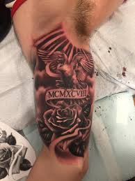 Birth Year Tattoo Designs For Men Rose Dove And Birth Year Done By Shiva Sharma At Black Pearl Tattoo Toronto On Rose Tattoo Sleeve Bicep Tattoo Rose Tattoos For Men