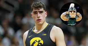 Former Iowa star Luka Garza alleges Michigan State manipulates rim tightness