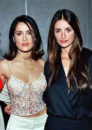 In the throwback snap from 1995, the 'pirates of the caribbean' actor is seen holding a drink as he posed beside hayek, who was wearing a white dress with a plunging neckline Dated Timeless And Modern Mysteries Of Style