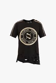 Balmain Black And Gold T Shirt Balmain X Puma Black Cotton T Shirt With Gold Badge For Women Balmain Com In 2020 Balmain Cotton Tshirt Black Cotton