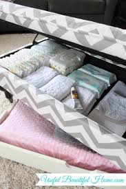 Hidden Diaper Changing Station In The Living Room Baby Room Storage Baby Room Diy Diaper Changing Station Organization