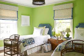 Brighten your living room with an olive green paint color. Apple Green Paint Color Design Ideas