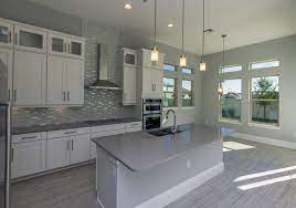 A stylish white subway tile backsplash was also used to complete the vintage look of the room. 30 Gray And White Kitchen Ideas Kitchen Cabinets Grey And White Gray And White Kitchen Grey Backsplash