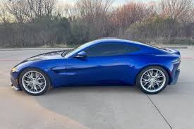 Image result for Concours Blue 2021 Aston Martin