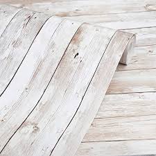 In the case of repeating patterns, be sure to allow enough extra spillover so each row is. Amazon Com Wood Wallpaper 17 71 X 118 Self Adhesive Removable Wood Peel And Stick Wallpaper Decorative Wall Covering Vintage Wood Panel Interior Film Wood Wallpaper Home Kitchen