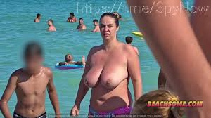 Hot milf with big boobs on the beach - ThisVid.com